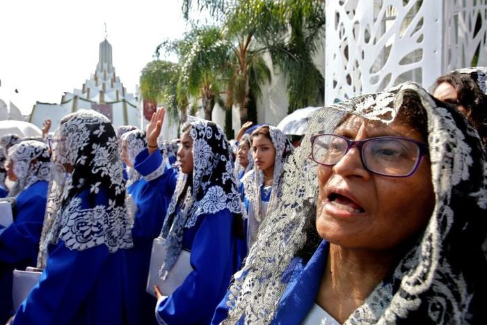 Followers of the Light of the World, a Mexican Pentecostal church whose controversial leader has been arrested, attend its annual gathering in Guadalajara on August 9