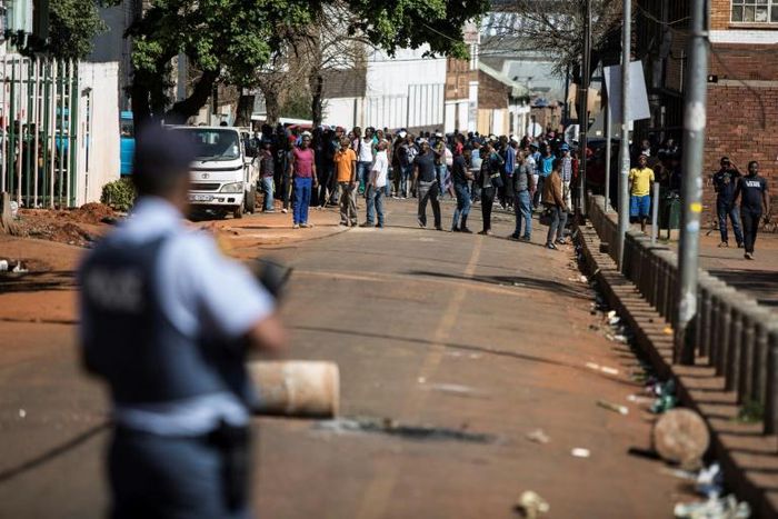 Gangs of aggressors armed with sticks and machetes attacked businesses in South Africa's financial capital last month during deadly xenophobic attacks