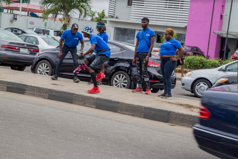 Dancers displaying mastery and energy during the road show.