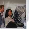 Helping hand: Prince Harry and his wife Meghan, the Duchess of Sussex, at a youth employment hub in Johannesburg