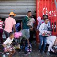 Looters take items from an alleged foreign-owned shop in Johannesburg suburb of Turffontein on Sept. 2, 2019.Photographer: Guillem Sartorio/AFP/Getty Images