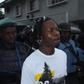 Naira Marley being led to court by men of the EFCC amidst a watertight security. [Twitter/@officialEFCC]