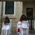 Lebanese protesters stage a mock hanging in a symbolic performance against sectarianism (C), Lebanon's 1975-90 civil war (R) and corruption during ongoing anti-government demonstrations in Beirut on November 3, 2019