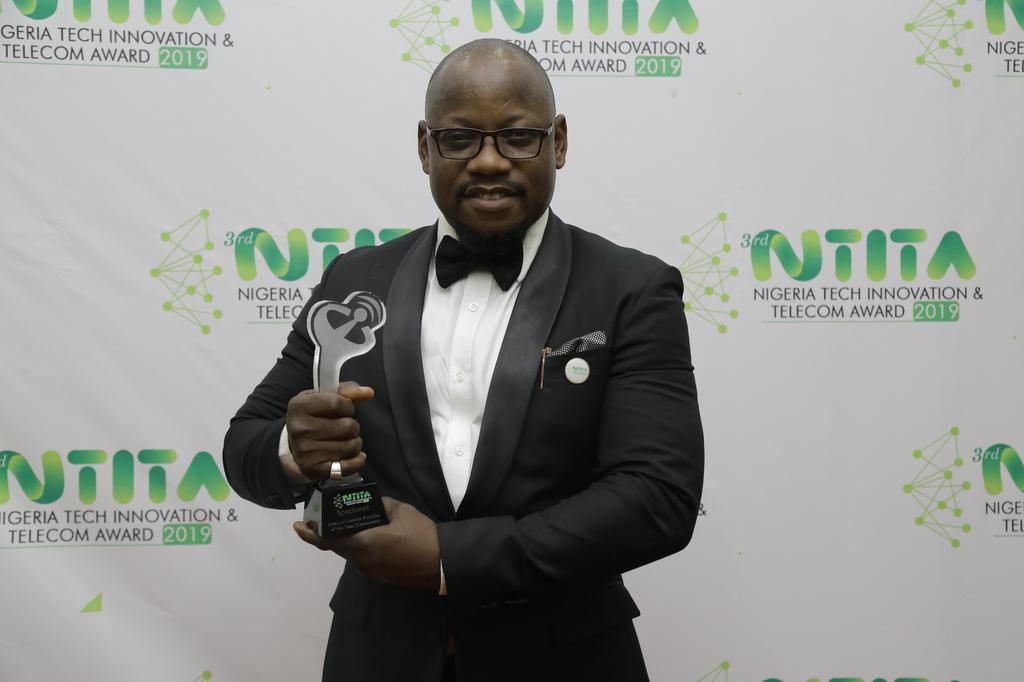 Marketing Manager, Spectranet Limited, Samson Akejelu (right) receiving the Internet Service Provider of the Year (Consumer) scooped by Spectranet 4G LTE from President, Association of Telecommunications Companies of Nigeria (ATCON), Olusola Teniola at...