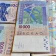 CFA banknotes issued by the  Central Bank of West African States -- but the currency's pegging to the euro is controversial and  politically sensitive, prompting moves to introduce a new currency, the eco