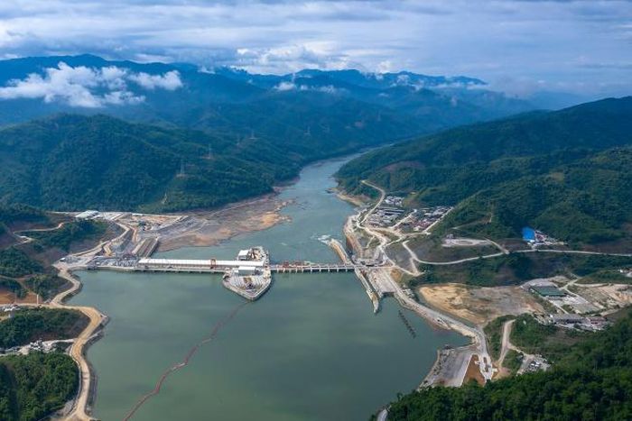 An undated CK Power-issued photo shows shows the Xayaburi dam hydro project on a swollen Mekong river in Laos, but independent images taken downstream paint a different picture