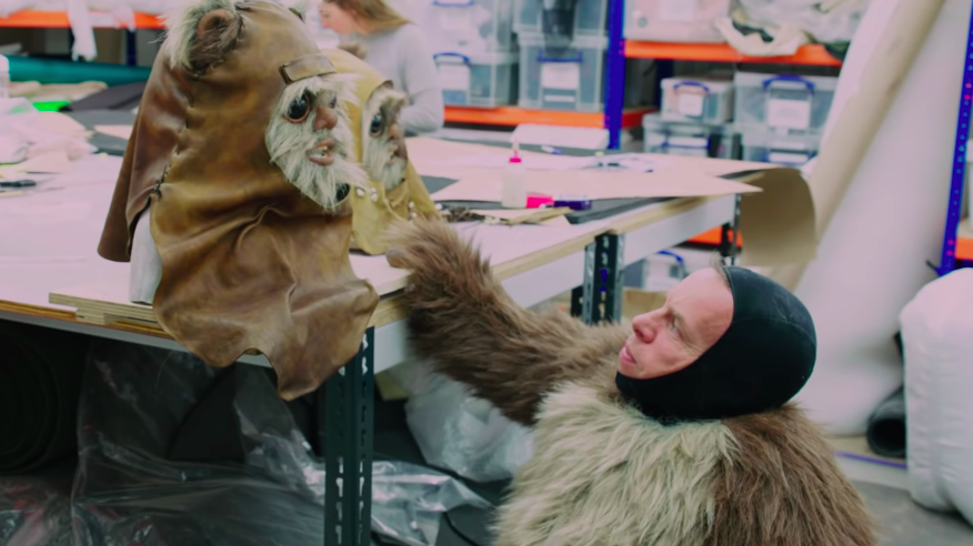 Warwick Davis in costume as Wicket in The Rise of Skywalker featurette.