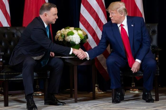 US President Donald Trump (R) and Polish President Andrzej Duda signed a deal increasing number of American troops in the latter's country