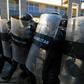 Police clash with protesters demanding the resignation of Honduran President Juan Orlando Hernandez