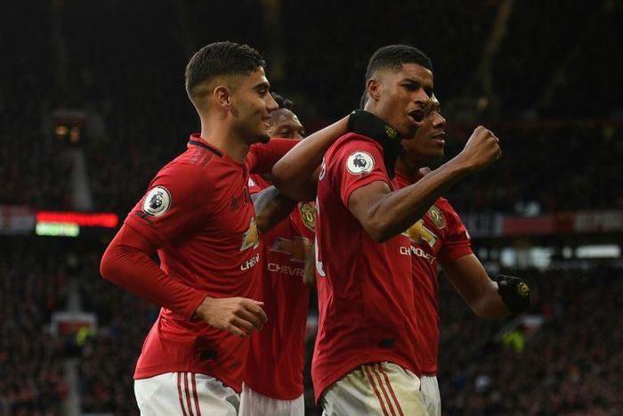 Marcus Rashford (right) celebrates his goal in Manchester United's 3-1 win over Brighton