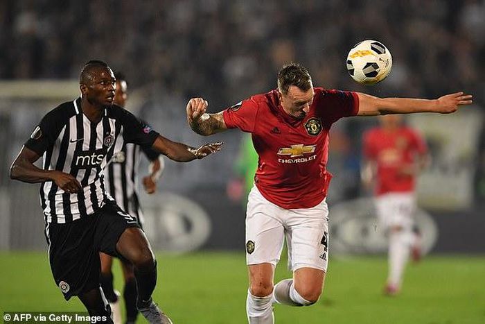 Sadiq Umar and Phil Jones (AFP/Getty Images)