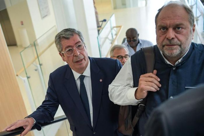 Patrick Balkany, left, arriving at the Paris courthouse on Friday with his lawyer Eric Dupond-Moretti. Balkany was sentenced to four years in prison for tax fraud.