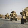 US military vehicles in northern Syria after US forces pulled out of their base in Tal Tamr on October 20