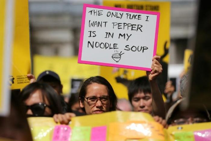One London marcher's protest asgainst the Hong Kong police's use of pepper spray against protesters