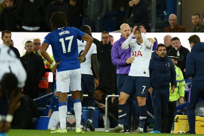 Son Heung-Min (C) was left distraught after his foul resulted in a grisly injury to Everton's Andre Gomes