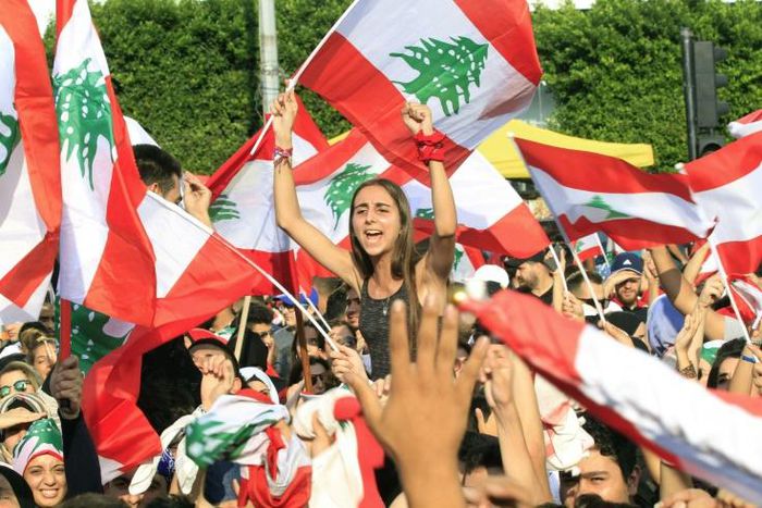 Protests took place across Lebanon, with demonstrators waving Lebanese flags in the crowd in the southern city of Sidon