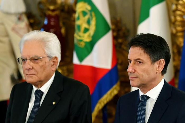 Italy's President Sergio Mattarella (L) and Italy's Prime Minister Giuseppe Conte attend the swearing-in ceremony of the new government