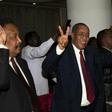 Delegation members of Sudan's transitional government react after two-week long peace talks with rebels in Juba in October