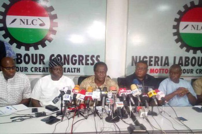 NLC President Ayuba Wabba (M) addressing a world press conference