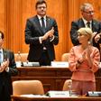 Romanian Prime Minister Ludovic Orban is applauded by members of his cabinet after a vote for a new government at the Romanian Parliament in Bucharest on November 4, 2019