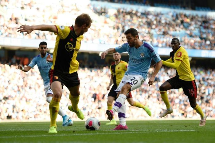 Manchester City's Bernardo Silva scores the sixth goal against Watford