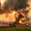 A building at a vineyard is engulfed in flames from the Kincade fire near Geyserville, California on October 24, 2019