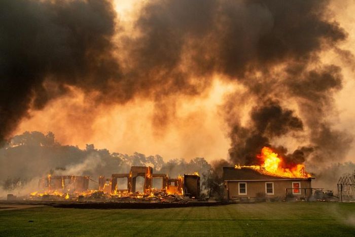 A building at a vineyard is engulfed in flames from the Kincade fire near Geyserville, California on October 24, 2019
