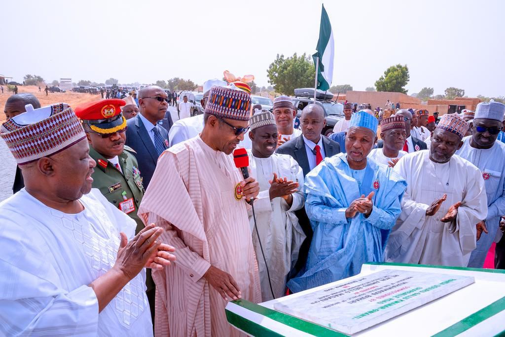 President Muhammadu Buhari performs the groundbreaking ceremony for the construction of University of Transportation, Daura. [Twitter/@BayoOmoboriowo]