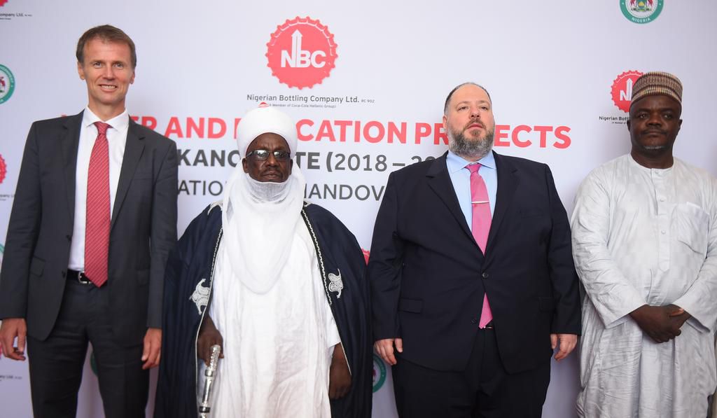 L-R: Group Quality, Safety & Environment Director, Coca-Cola Hellenic Bottling Company (CCHBC), Zoltan Syposs; Seriki Fulani Jaedanawa of Kano, Abubakar Gwadabe Buhari; Managing Director, Nigerian Bottling Company Limited, George Polymenakos and Genera...