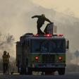Firefighters work during the Tick Fire on October 24, 2019 in Canyon Country, California.
