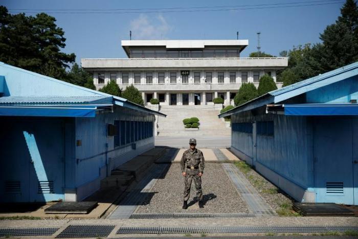 The alleged North Korean murderers were handed back to Pyongyang authorities at Panmunjom inside the demilitarized zone