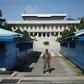 The alleged North Korean murderers were handed back to Pyongyang authorities at Panmunjom inside the demilitarized zone