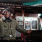 Venezuelan nurse Edgar Fernandez, who works at a state hospital, sings in mariachi costume at a restaurant at the town of El Junquito near Caracas