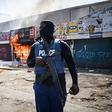 One of the Nigerian-owned shop being razed by the looters in Pretoria Business District on Wednesday (NAN)