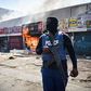 One of the Nigerian-owned shop being razed by the looters in Pretoria Business District on Wednesday (NAN)