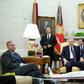 Republican US Senator Lindsey Graham (L) blocked an effort to quickly pass a resolution recognizing the Armenian genocide, shortly after meeting Turkish President Recep Tayyip Erdogan and US President Donald Trump at the White House

listens as US Pres...