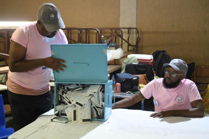 Time to count: Polling officers check ballots in a Gaborone constituency. The vote marks the first time that the 53-year dominance of Botswana Democratic Party is under threat