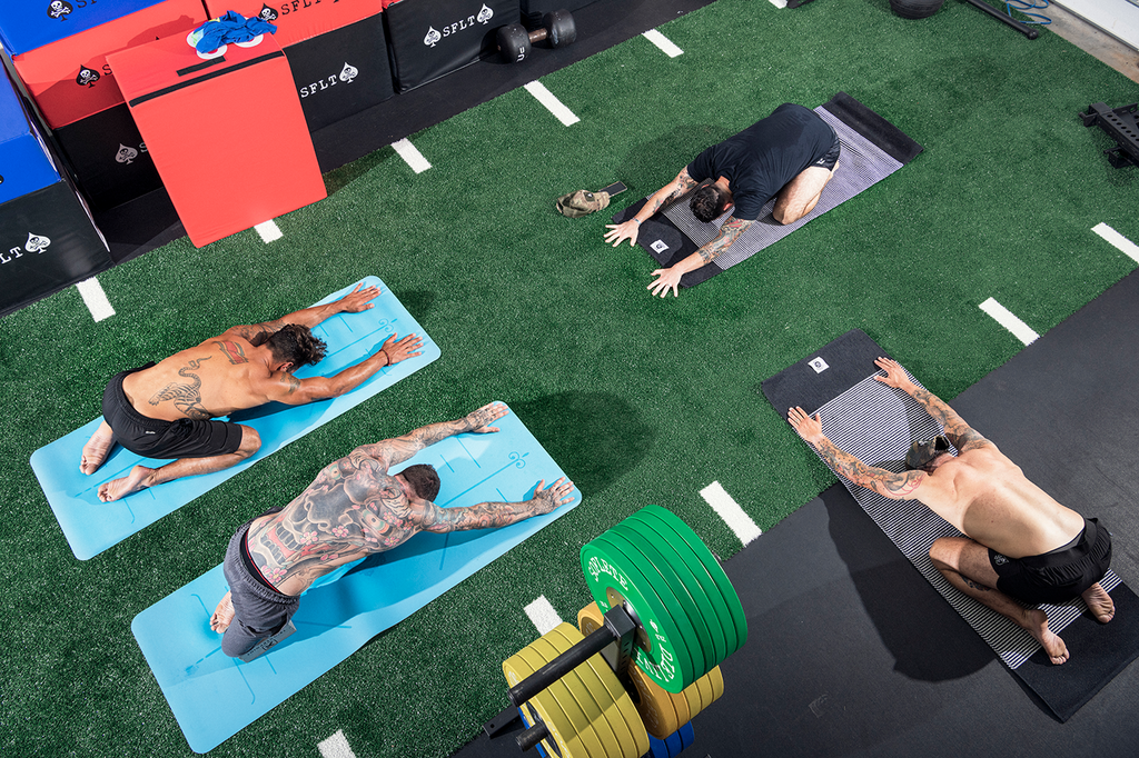 <strong><strong><strong><strong><strong>DOWNWARDLY MOBILE</strong> </strong></strong></strong></strong>The crew doing a yoga-inspired cool down.