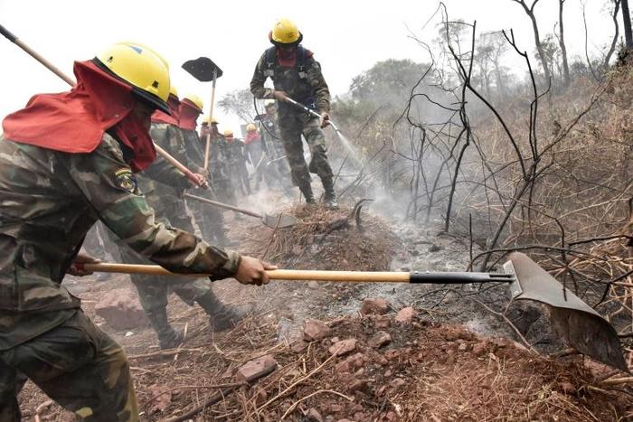 Bolivian soldiers combat forest fires in Otuquis National Park, in the Pantanal ecoregion of southeastern Bolivia, on August 26, 2019