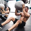 Grab a Partner and a Med Ball to Smash Your Abs