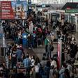 Thousands have been stranded at Santiago's international airport with flights cancelled and delayed because of unrest in the city