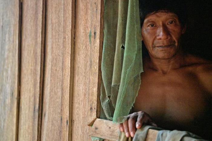 A member of Uru Eu Wau Wau tribe poses in the tribe's reserve in the Amazon, south of Porto Velho, Brazil, on August 29, 2019