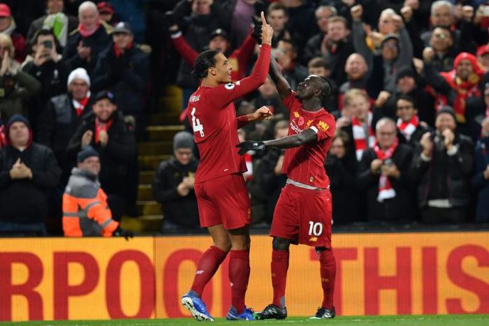Senegalese Sadio Mane (R) celebrates with Virgil van Dijk after scoring for Liverpool against Manchester City last weekend