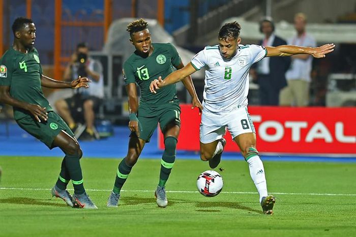 Tokyo Olympic Games hopeful Samuel Chukwueze (C) playing for Nigeria against Algeria in the Africa Cup of Nations semi-finals