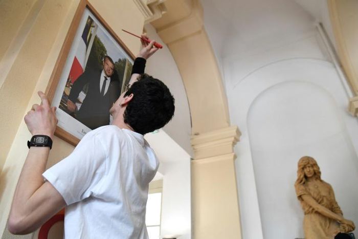 The acts of civil disobedience were part of a movement called "Take Down Macron" highlighting alleged inaction by the French government over global warming