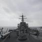 The US military has been using guided-missile destroyers like this one, the USS John McCain, seen here in a US Navy photo, as it seeks to enforce an international 'freedom of operation' near islands claimed by Beijing in the South China Sea