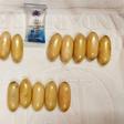 This handout from Thailand's Office of the Narcotics Control Board shows capsules of cocaine found in the possession of Kenyan national Glenn Chibasellow Ooko at Suvarnabhumi airport in Bangkok