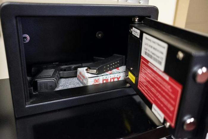 Guns in fingerprint-activated safes are placed in designated classrooms around Sidney High School in the US state of Ohio for a response team of teachers to use in case of an active shooter