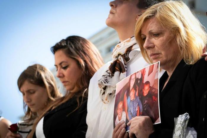 The mother (right) of Johanna, who was stabbed to death by her partner in front of their three children, attended a rally against domestic violence in Le Havre, northwest France