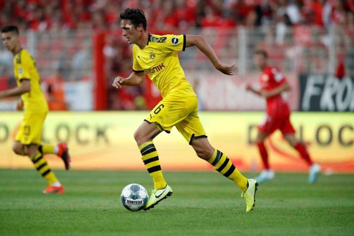 Borussia Dortmund midfielder Thomas Delaney (R) is expected to be out until January after tearing ankle ligaments on international duty with Denmark